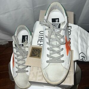 Golden Goose Women’s Distressed Super-Star Classic With List Leather Sneakers